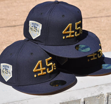 Eight One New Era .45s Navy Gold